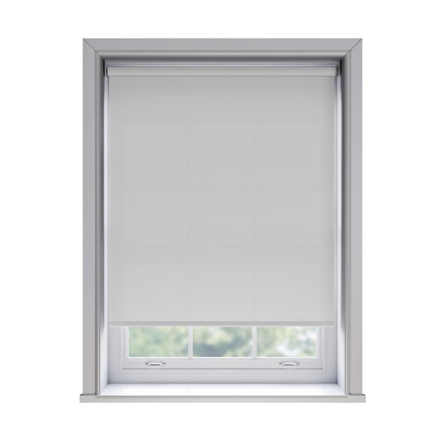 Splash Paper light filtration roller blind fitted in a white sash window